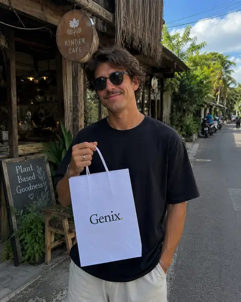 A Genix customer in Bali receiving their sealed delivery parcel